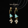 Elegant tassel earrings with floral design, soft and feminine, perfect for daily outfits