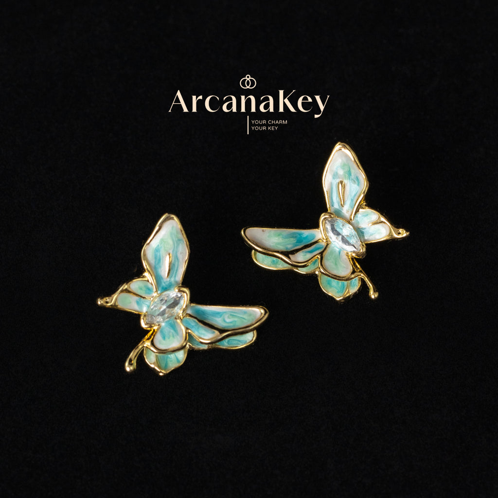 Vintage butterfly earrings with enamel drip finish & asymmetrical design