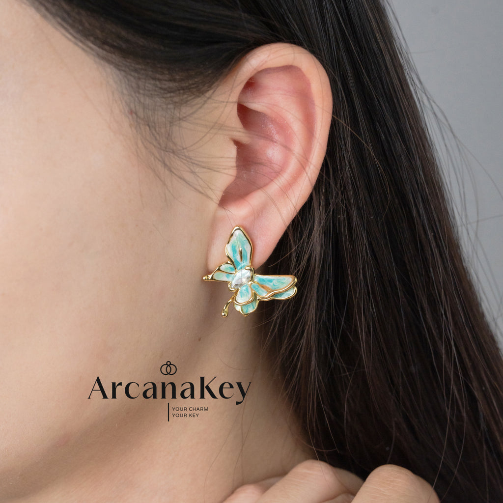 Vintage butterfly earrings with enamel drip finish & asymmetrical design