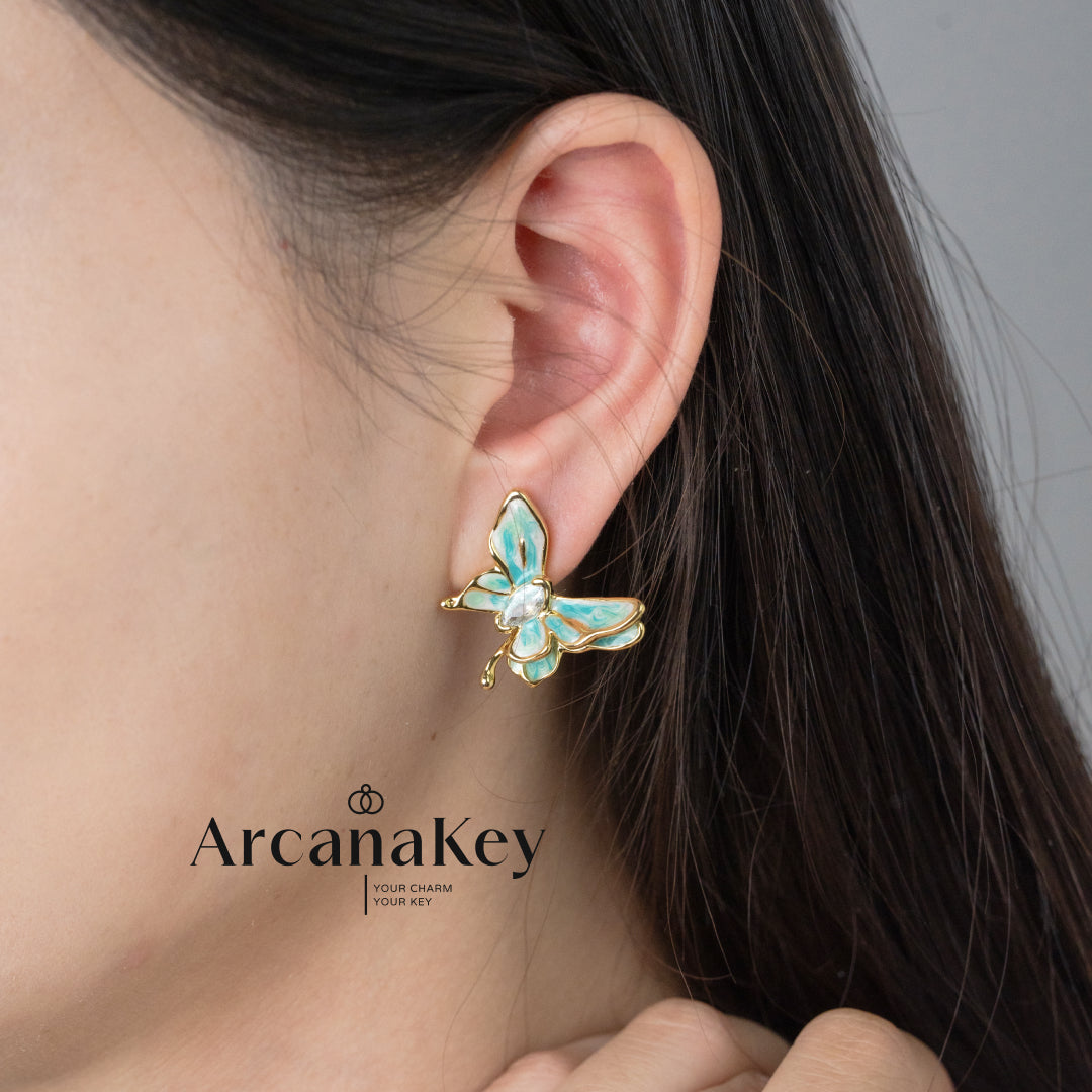 Vintage butterfly earrings with enamel drip finish & asymmetrical design