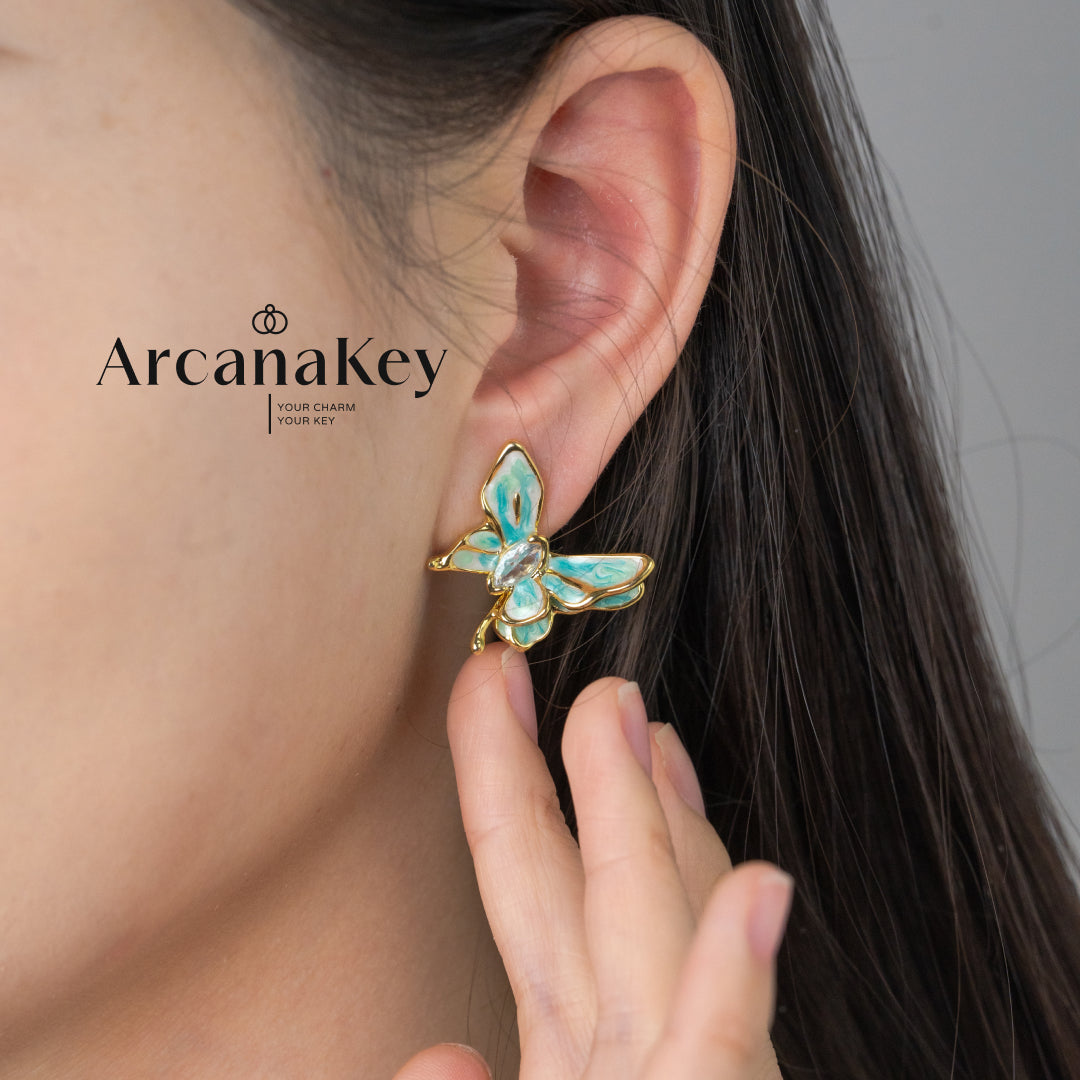 Vintage butterfly earrings with enamel drip finish & asymmetrical design