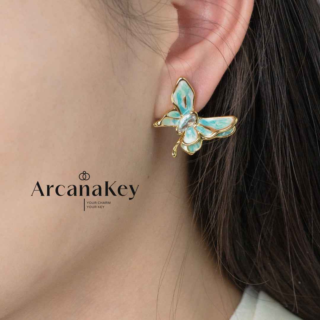 Vintage butterfly earrings with enamel drip finish & asymmetrical design