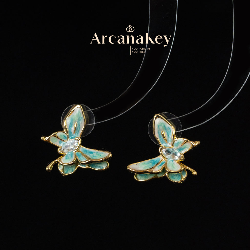Vintage butterfly earrings with enamel drip finish & asymmetrical design