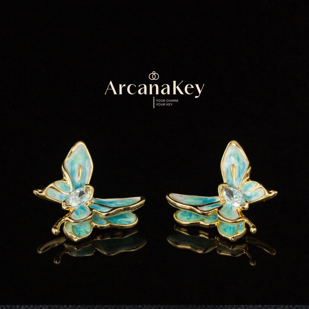 Vintage butterfly earrings with enamel drip finish & asymmetrical design