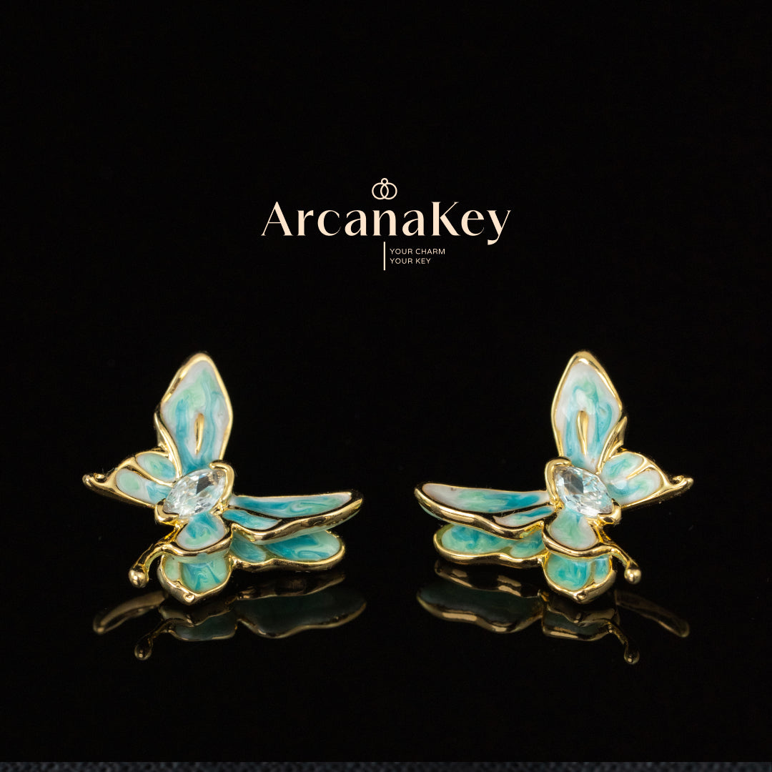 Vintage butterfly earrings with enamel drip finish & asymmetrical design