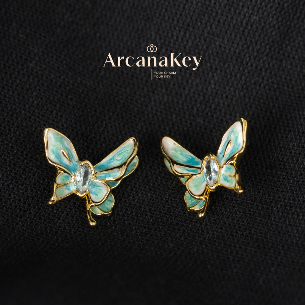 Vintage butterfly earrings with enamel drip finish & asymmetrical design