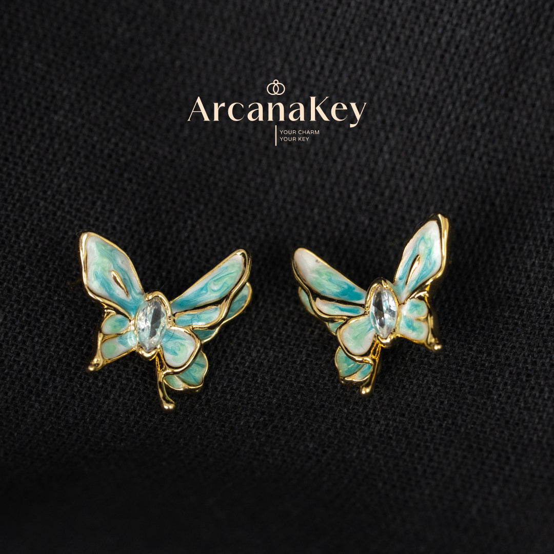 Vintage butterfly earrings with enamel drip finish & asymmetrical design