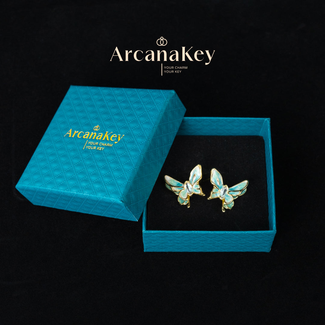 Vintage butterfly earrings with enamel drip finish & asymmetrical design